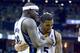 MEMPHIS, TN - APRIL 24: Zach Randolph #50 and Courtney Lee #5 of the Memphis Grizzlies hug after the 98-95 OT win over the Oklahoma City Thunder in Game 3 of the Western Conference Quarterfinals during the 2014 NBA Playoffs at FedExForum on April 24, 20