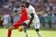 Jun 1, 2014; Harrison, NJ, USA; United States forward Jozy Altidore battles for the ball with Turkey defender Hakan Kadir Balta during the second half of their international friendly soccer match at Red Bull Arena. The United States defeated Turkey 2-1.