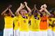 CUIABA, BRAZIL - JUNE 24: James Rodriguez (L) and Pablo Armero (R) of Colombia acknowledge the fans after the 2014 FIFA World Cup Brazil Group C match between Japan and Colombia at Arena Pantanal on June 24, 2014 in Cuiaba, Brazil. (Photo by Gabriel Ros