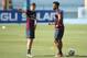 RIO DE JANEIRO, BRAZIL - JUNE 09: Adam Lallana of England (L) talks with Daniel Sturridge of England during a training session at the Urca military base (Forte de Urca) training ground on June 9, 2014 in Rio de Janeiro, Brazil. (Photo by Richard Heathco