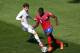 BELO HORIZONTE, BRAZIL - JUNE 24: Joel Campbell of Costa Rica controls the ball against Adam Lallana of England during the 2014 FIFA World Cup Brazil Group D match between Costa Rica and England at Estadio Mineirao on June 24, 2014 in Belo Horizonte, Braz
