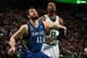 BOSTON, MA - DECEMBER 16: Kevin Love #42 of the Minnesota Timberwolves boxes out Jeff Green #8 of the Boston Celtics on December 16, 2013 at the TD Garden in Boston, Massachusetts. NOTE TO USER: User expressly acknowledges and agrees that, by downloading
