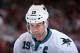 GLENDALE, AZ - APRIL 12: Joe Thornton #19 of the San Jose Sharks skates up to a face off against the Phoenix Coyotes during the NHL game at Jobing.com Arena on April 12, 2014 in Glendale, Arizona. The Sharks defeated the Coyotes 3-2. (Photo by Christian
