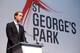 BURTON-UPON-TRENT, ENGLAND - OCTOBER 09: Prince William, Duke of Cambridge gives a speech as Catherine, Duchess of Cambridge looks on during the official launch of The Football Association's National Football Centre at St George's Park on October 9, 201