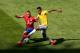 BELO HORIZONTE, BRAZIL - JUNE 28: Arturo Vidal of Chile and Luiz Gustavo of Brazil compete for the ball during the 2014 FIFA World Cup Brazil round of 16 match between Brazil and Chile at Estadio Mineirao on June 28, 2014 in Belo Horizonte, Brazil. (Pho
