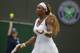 Jun 28, 2014; London, United Kingdom; Serena Williams (USA) reacts during her match against Alize Cornet (FRA) on day six of the 2014 Wimbledon Championships at the All England Lawn and Tennis Club. Mandatory Credit: Susan Mullane-USA TODAY Sports