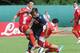 TRENTO, ITALY - JULY 23: Edoardo Vargas (C) of Napoli his tackled to Marco Crimi (R) of Grosseto during the pre-season friendly match between SSC Napoli and US Grosseto on July 23, 2012 in Dimaro near Trento, Italy. (Photo by Dino Panato/Getty Images)