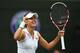 LONDON, ENGLAND - JUNE 28: Alize Cornet of France celebrates after winning her Ladies' Singles third round match against Serena Williams of the United States on day six of the Wimbledon Lawn Tennis Championships at the All England Lawn Tennis and Croquet