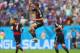 RECIFE, BRAZIL - JUNE 26: Thomas Mueller of Germany (C) celebrates scoring his team's first goal during the 2014 FIFA World Cup Brazil group G match between the United States and Germany at Arena Pernambuco on June 26, 2014 in Recife, Brazil. (Photo by