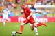 RIO DE JANEIRO, BRAZIL - JUNE 22: Kevin De Bruyne of Belgium controls the ball as Denis Glushakov of Russia gives chase during the 2014 FIFA World Cup Brazil Group H match between Belgium and Russia at Maracana on June 22, 2014 in Rio de Janeiro, Brazil.