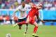 SALVADOR, BRAZIL - JUNE 20: Karim Benzema of France and Valon Behrami of Switzerland compete for the ball during the 2014 FIFA World Cup Brazil Group E match between Switzerland and France at Arena Fonte Nova on June 20, 2014 in Salvador, Brazil. (Photo