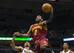 Apr 11, 2014; Milwaukee, WI, USA; Cleveland Cavaliers guard Kyrie Irving (2) drives for a shot during the first quarter against the Milwaukee Bucks at BMO Harris Bradley Center. Mandatory Credit: Jeff Hanisch-USA TODAY Sports