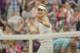 Jun 30, 2014; London, United Kingdom; Eugenie Bouchard (CAN) celebrates recording match point in her match against Alize Cornet (FRA) on day seven of the 2014 Wimbledon Championships at the All England Lawn and Tennis Club. Mandatory Credit: Susan Mullane