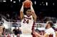 Feb 22, 2014; Stanford, CA, USA; Stanford Cardinal forward Josh Huestis (24) holds onto a rebound against the UCLA Bruins in the second half at Maples Pavilion. The Cardinal defeated the Bruins 83-74. Mandatory Credit: Cary Edmondson-USA TODAY Sports