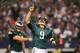 ARLINGTON, TX - DECEMBER 29: Nick Foles #9 of the Philadelphia Eagles celebrates a second quarter touchdown against the Dallas Cowboys at Cowboys Stadium on December 29, 2013 in Arlington, Texas. (Photo by Ronald Martinez/Getty Images)