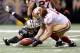 NEW ORLEANS, LA - NOVEMBER 17: Raymond Ventrone #41 of the San Francisco 49ers scoops up a fumble by Lance Moore #16 of the New Orleans Saints at Mercedes-Benz Superdome on November 17, 2013 in New Orleans, Louisiana. (Photo by Kevin C. Cox/Getty Images