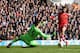 LONDON, ENGLAND - MARCH 23: Adam Lallana of Southampton scores his team's second goal past Hugo Lloris of Tottenham Hotspur during the Barclays Premier League match between Tottenham Hotspur and Southampton at White Hart Lane on March 23, 2014 in London,
