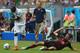 RECIFE, BRAZIL - JUNE 26: Head coach Jurgen Klinsmann of United States looks on as Thomas Mueller (R) of Germany loses out to DaMarcus Beasley of the United States during the 2014 FIFA World Cup Brazil Group G match between USA and Germany at Arena Perna