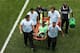 BRASILIA, BRAZIL - JUNE 30: Ogenyi Onazi of Nigeria is stretchered off after a challenge during the 2014 FIFA World Cup Brazil Round of 16 match between France and Nigeria at Estadio Nacional on June 30, 2014 in Brasilia, Brazil. (Photo by Celso Junior/G