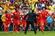 BELO HORIZONTE, BRAZIL - JUNE 17: Marouane Fellaini of Belgium (R) celebrates scoring his team's first goal with head coach Marc Wilmots during the 2014 FIFA World Cup Brazil Group H match between Belgium and Algeria at Estadio Mineirao on June 17, 2014