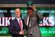 Jun 26, 2014; Brooklyn, NY, USA; Jabari Parker (Duke) tips his cap to the crowd while standing with NBA commissioner Adam Silver after being selected as the number two overall pick to the Milwaukee Bucks in the 2014 NBA Draft at the Barclays Center. Manda