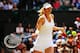 LONDON, ENGLAND - JULY 01: Maria Sharapova of Russia plays a forehand return during her Ladies' Singles fourth round match against Angelique Kerber of Germany on day eight of the Wimbledon Lawn Tennis Championships at the All England Lawn Tennis and Croq