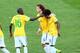 BELO HORIZONTE, BRAZIL - JUNE 28: Willian is consoled by Ramires and David Luiz of Brazil after missing a penalty kick in the shootout during the 2014 FIFA World Cup Brazil round of 16 match between Brazil and Chile at Estadio Mineirao on June 28, 2014 in