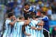 SAO PAULO, BRAZIL - JULY 01: Angel di Maria of Argentina celebrates scoring his team's first goal in extra time with teammates during the 2014 FIFA World Cup Brazil Round of 16 match between Argentina and Switzerland at Arena de Sao Paulo on July 1, 2014