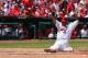 Yadier Molina slides into home in a game against the Phillies on June 22.