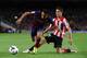 BARCELONA, SPAIN - APRIL 20: Alexis Sanchez of FC Barcelona duels for the ball with Ander Herrera of Athletic Club during the La Liga match between FC Barcelona and Athletic Club at Camp Nou on April 20, 2014 in Barcelona, Spain. (Photo by David Ramos/G