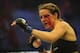 Nov 6, 2013; Fort Campbell, KY, USA; Alexis Davis (blue gloves) fights Liz Carmouche (red gloves) in the women's bantamweight bout during UFC Fight for the Troops at Fort Campbell. Mandatory Credit: Joshua Lindsey-USA TODAY Sports