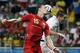 Jul 1, 2014; Salvador, Bahia, BRAZIL; Belgium defender Daniel van Buyten (15) and United States forward Clint Dempsey (8) go up for a head ball during the first half of their round of sixteen match in the 2014 World Cup at Arena Fonte Nova. Mandatory Cred