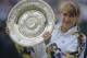 German tennis player Steffi Graf with the trophy after winning the Ladies' Singles final at Wimbledon, London, 4th July 1993. Graf beat Jana Novotna of the Czech Republic 7-6 (6), 1-6, 6-4 to win the title. (Photo by Bob Martin/Getty Images)