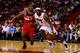 MIAMI, FL - NOVEMBER 03: LeBron James #6 of the Miami Heat dribbles the ball under pressure from Trevor Ariza #1 of the Washington Wizards at American Airlines Arena on November 3, 2013 in Miami, Florida. NOTE TO USER: User expressly acknowledges and agre