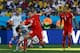 Admir Mehmedi wins the ball from Argentina's Lionel Messi.