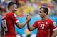 Josip Drmic, left, celebrates with Xherdan Shaqiri.