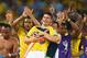 RIO DE JANEIRO, BRAZIL - JUNE 28: James Rodriguez of Colombia is picked up by goalkeeper David Ospina in celebration after defeating Uruguay 2-0 during the 2014 FIFA World Cup Brazil round of 16 match between Colombia and Uruguay at Maracana on June 28,