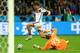 PORTO ALEGRE, BRAZIL - JUNE 30: Thomas Mueller of Germany attempts a shot against Rais M'Bolhi of Algeria during the 2014 FIFA World Cup Brazil Round of 16 match between Germany and Algeria at Estadio Beira-Rio on June 30, 2014 in Porto Alegre, Brazil. (