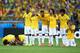 BELO HORIZONTE, BRAZIL - JUNE 28: (L-R) David Luiz, Thiago Silva, Luiz Gustavo, Ramires, Dani Alves, Jo, Marcelo, Hulk, Willian and Neymar of Brazil look on during a penalty shootout during the 2014 FIFA World Cup Brazil round of 16 match between Brazil