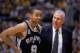 LOS ANGELES - MAY 5: Tony Parker #9 of the San Antonio Spurs talks to his head coach Gregg Popovich, during game 1 of the Western Conference Semifinals during the 2002 NBA Playoffs against the Los Angeles Lakers at the Staples Center, in Los Angeles, Cal