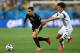 SAO PAULO, BRAZIL - JUNE 26: Eden Hazard of Belgium and Lee Chung-Yong of South Korea compete for the ball during the 2014 FIFA World Cup Brazil Group H match between South Korea and Belgium at Arena de Sao Paulo on June 26, 2014 in Sao Paulo, Brazil. (