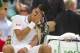 Jun 27, 2014;2014; London, United Kingdom; Novak Djokovic (SRB) waits to receive treatment after slipping and falling during his match against Gilles Simon (FRA) on day five of the 2014 Wimbledon Championships at the All England Lawn and Tennis Club. Mand
