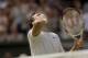 Jul 2, 2014; London, United Kingdom; Grigor Dimitrov (BUL) celebrates recording match point during his match against Andy Murray (GBR) on day nine of the 2014 Wimbledon Championships at the All England Lawn and Tennis Club. Mandatory Credit: Susan Mullan