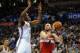 Nov 10, 2013; Oklahoma City, OK, USA; Washington Wizards center Marcin Gortat (4) attempts a shot against Oklahoma City Thunder small forward Kevin Durant (35) during the second quarter at Chesapeake Energy Arena. Mandatory Credit: Mark D. Smith-USA TODAY