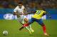 RIO DE JANEIRO, BRAZIL - JUNE 25: Loic Remy of France competes for the ball with Walter Ayovi of Ecuador during the 2014 FIFA World Cup Brazil Group E match between Ecuador and France at Maracana on June 25, 2014 in Rio de Janeiro, Brazil. (Photo by Cliv