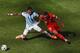 SAO PAULO, BRAZIL - JULY 01: Josip Drmic of Switzerland challenges Marcos Rojo of Argentina during the 2014 FIFA World Cup Brazil Round of 16 match between Argentina and Switzerland at Arena de Sao Paulo on July 1, 2014 in Sao Paulo, Brazil. (Photo by Ma