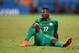 FORTALEZA, BRAZIL - JUNE 24: A dejected Serge Aurier of the Ivory Coast looks on during the 2014 FIFA World Cup Brazil Group C match between Greece and the Ivory Coast at Castelao on June 24, 2014 in Fortaleza, Brazil. (Photo by Laurence Griffiths/Getty