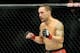 Jul 6, 2013; Las Vegas, NV, USA; Frankie Edgar (red gloves) during his Featherweight Bout against Charles Oliveira (not pictured) at the MGM Grand Garden Arena. Edgar won. Mandatory Credit: Jayne Kamin-Oncea-USA TODAY Sports