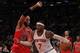 Dec 11, 2013; New York, NY, USA; Chicago Bulls power forward Taj Gibson (22) defends against New York Knicks small forward Carmelo Anthony (7) in the second half of NBA game at Madison Square Garden. Mandatory Credit: Noah K. Murray-USA TODAY Sports