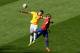 BELO HORIZONTE, BRAZIL - JUNE 28: Thiago Silva of Brazil and Arturo Vidal of Chile go up for a header during the 2014 FIFA World Cup Brazil round of 16 match between Brazil and Chile at Estadio Mineirao on June 28, 2014 in Belo Horizonte, Brazil. (Photo
